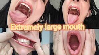 Opening his mouth very, very wide