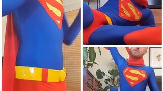 A horny superman jerks his cock in his spandex and speedo