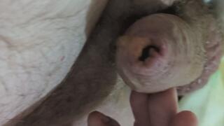 My leaking and showing how much piss my foreskin holds.