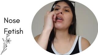 Inspecting my nose and blowing