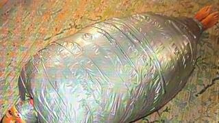 Mummification with 5 huge blankets and loads of tape