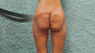 Punishment of a submissive with belt strikes