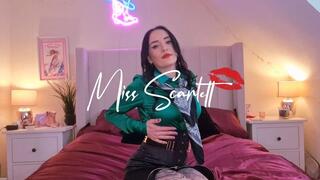 Scarlett's black satin pencil skirt and emerald tease