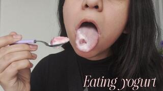 Slow and sensually eating yogurt