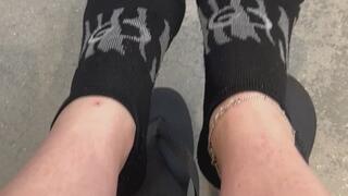 Holey socks and flip flops