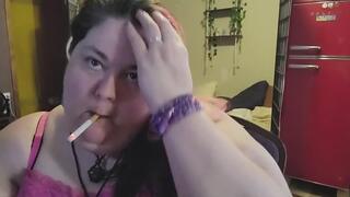 Ssbbw smoking while playing with my neck and massive arms