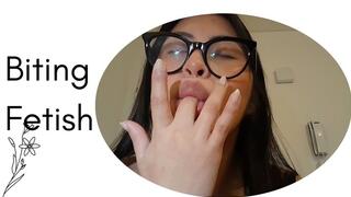 Biting my fingers leaving marks and many kisses on my skin