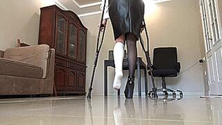 at work with a sprained leg