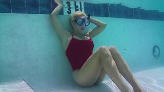 Underwater play in snorkeling mask, breathholding, blowing bubbles, underwater lap swim