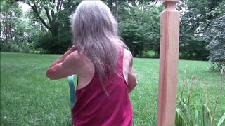 Lilly, the porch, her back, her long granny hair