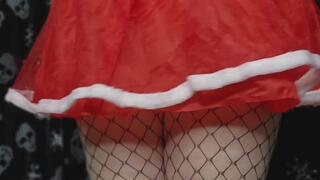 Lollipop, Santa's BBW helper putting on her fishnet thigh highs and shows you her big ass in a vinyl black thong and red mini skirt.