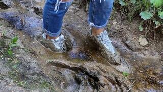 Fila Disruptor 2 on the muddy road, sneakers muddy, wrecked sneakers, sneakers in deep mud, ruined sneakers