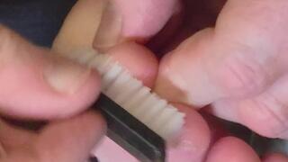 Mistress Molly's beautiful size 42 feet are given attention by switch guapo