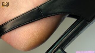 Foot and sandal fetish admiration, dangling and amazing feet colse-up, lovely bare heel soles.