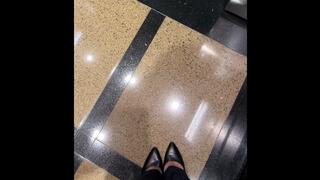 Strutting in Heels Through Parking Garage