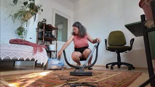 maid cleaning dirty carpet in tight pencil skirt and silk blouse