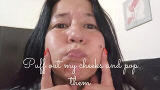 Puff out my cheeks and pop them
