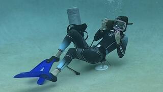 Stuck to the Pool Drain with Nathalia in Scuba