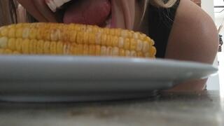 Devouring corn on the cob mouth stuffing