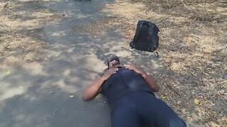 woman sitting on the security guard's face