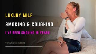 Smoking & Coughing in Leather Mini – Bare Legs & Plunge Top