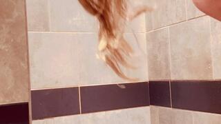 Carissa showering at the truck stop (vertical orientation)