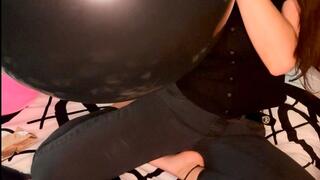 Black 36” balloon half blown by your Empress