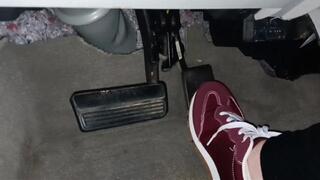 Evalynn driving in new red sneakers 2