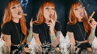 Smoking a big fat cigar in denim skirt