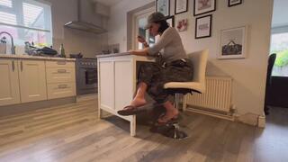 Flip Flops Dangling And Sexy Soles Tease