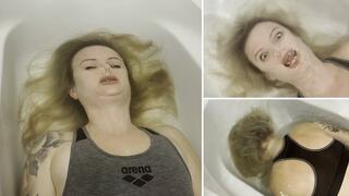 Anastasia struggle to hold her breath underwater