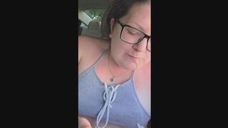 Reina Lokita eating in the car and smoking