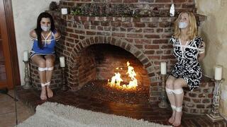 No Escape Anytime Soon For Holly Manning And Eden Wells, Who Are Tightly Trussed Up Tape Gagged And Seated Facing Each Other!