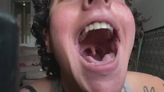 Big long uvula and mouth showing