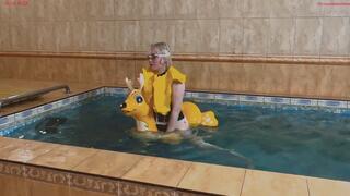 Alla hot fucks an inflatable deer and pops it with her fingernail, falls into the water, and is saved by an automatic inflatable life jacket