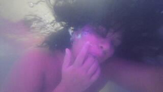 Blowing kisses underwater