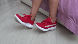 Wiggling my toes in my soft red sneakers b