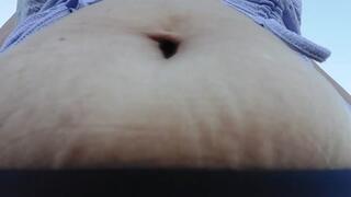 pretty in purple under Latina milf Giantess Bouncy bloated Belly Bouncy as she walks while occasionally fingering her BellyButton in a crop top