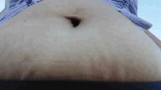 pretty in purple under Latina milf Giantess Bouncy bloated Belly Bouncy as she walks while occasionally fingering her BellyButton in a crop top avi