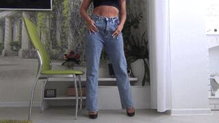 toe tapping video clip with crossed legs in jeans b