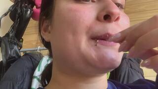 Chewing a gum and making bubbles with the