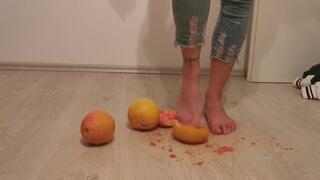 Stella crushing grapefruits barefoot