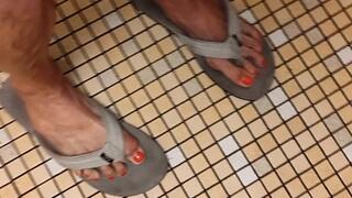 Flexing muscular calves and veins