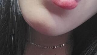 Close-up of red lips and boobs