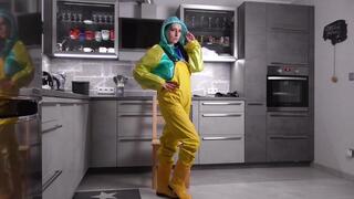 Amira in layers of plastic rainwear and Friensennerz bondage part 1 BTS dressing up