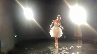 Ballerina on a wet stage