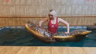Alla's hot ride on a bright gold inflatable ring in the pool with real pleasure