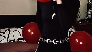Empress Scarlett blows and rides big red balloons until they burst