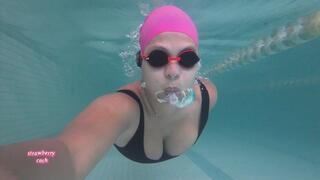 Blowing bubbles in the swimming pool