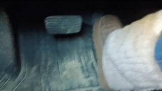 Evalynn driving the loaner in furry winter boots 2